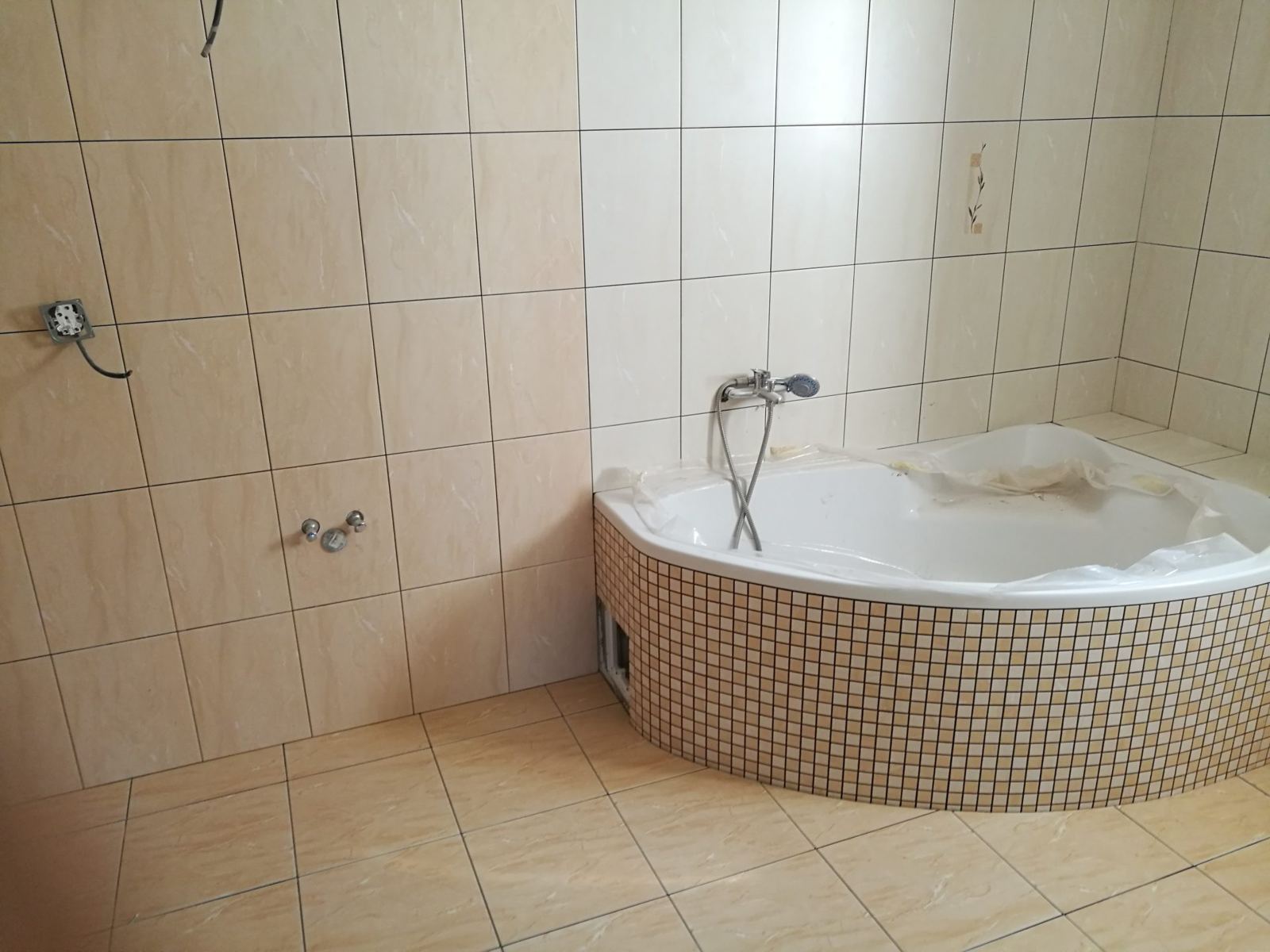 Rekonstrukce koupelny s obklady